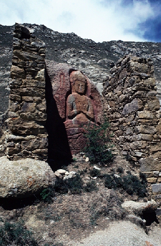 Buddhist Image on a rock wall .. was inside of temple.